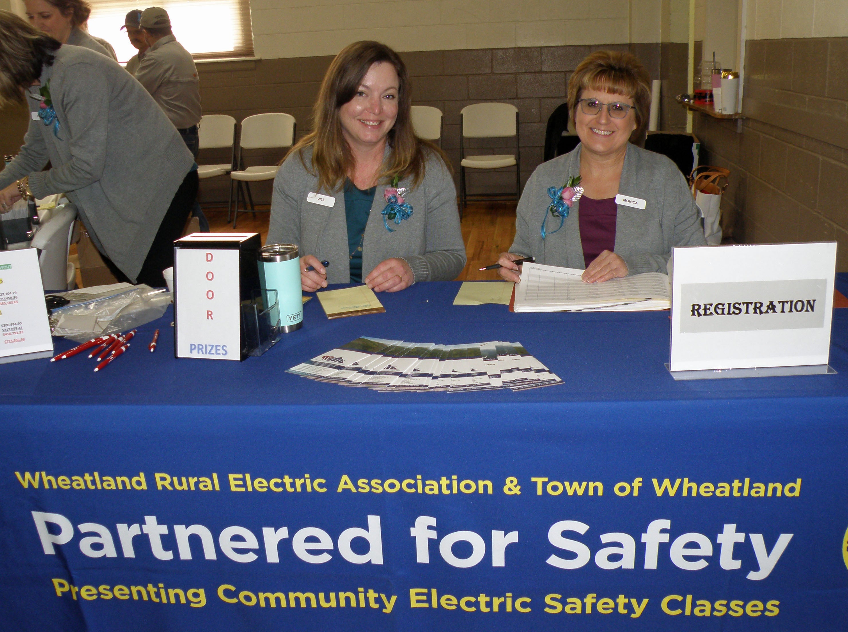 Jill Goodrich and Monica Koerwitz at the registration table